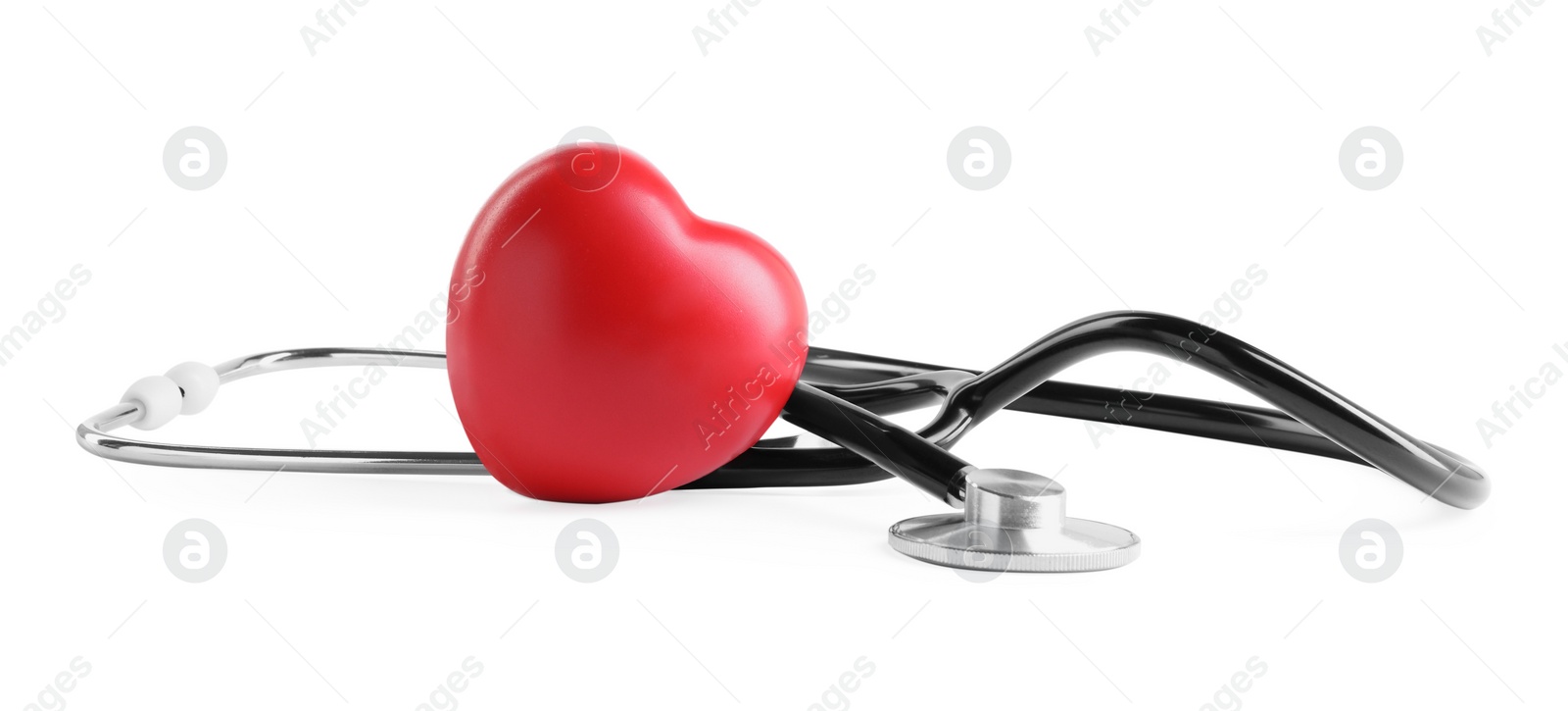 Photo of Stethoscope and red heart isolated on white