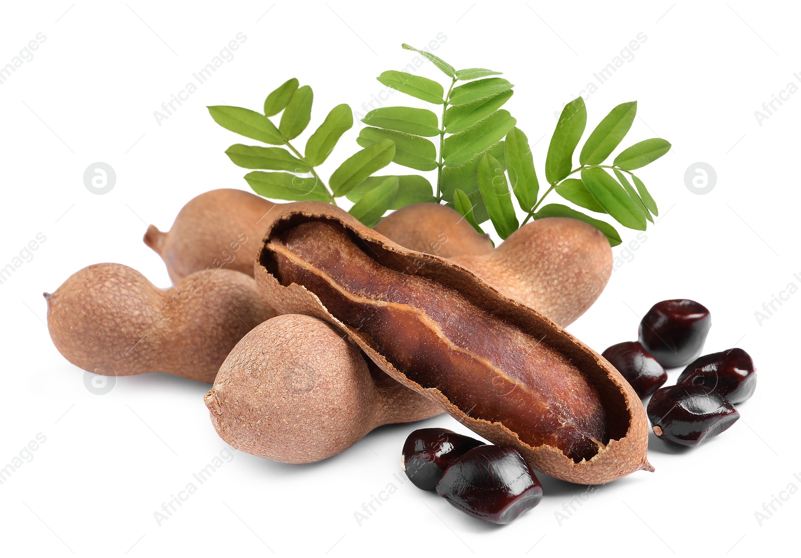 Image of Delicious ripe tamarinds on white background. Exotic fruit