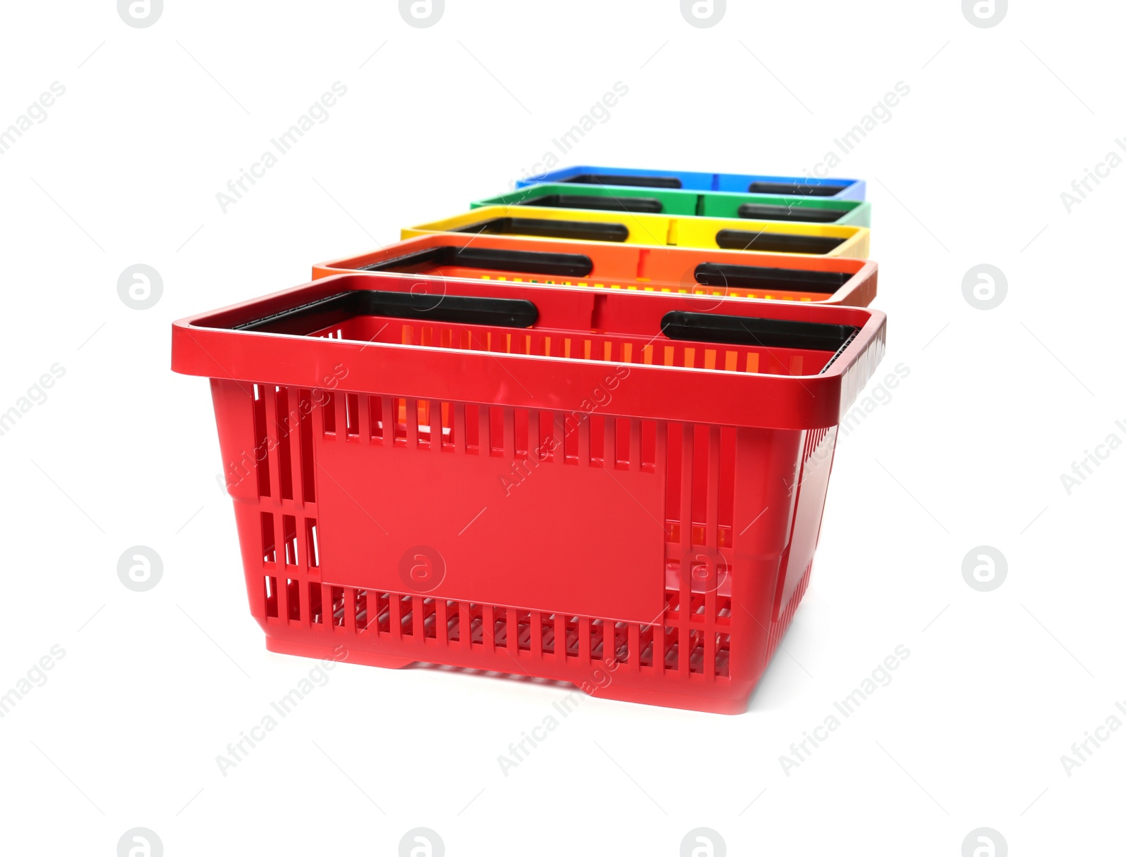 Photo of Colorful plastic shopping baskets on white background