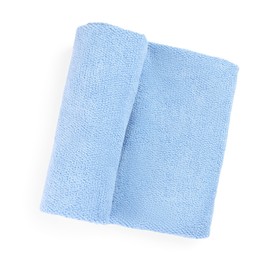 Photo of Light blue soft terry towel isolated on white, top view