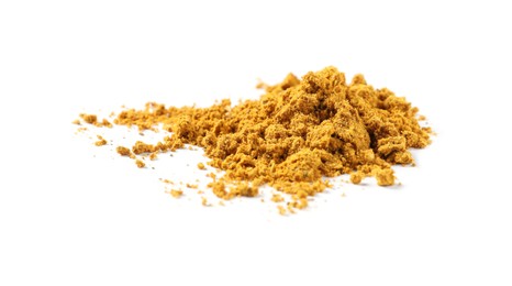 Photo of Pile of dry curry powder isolated on white