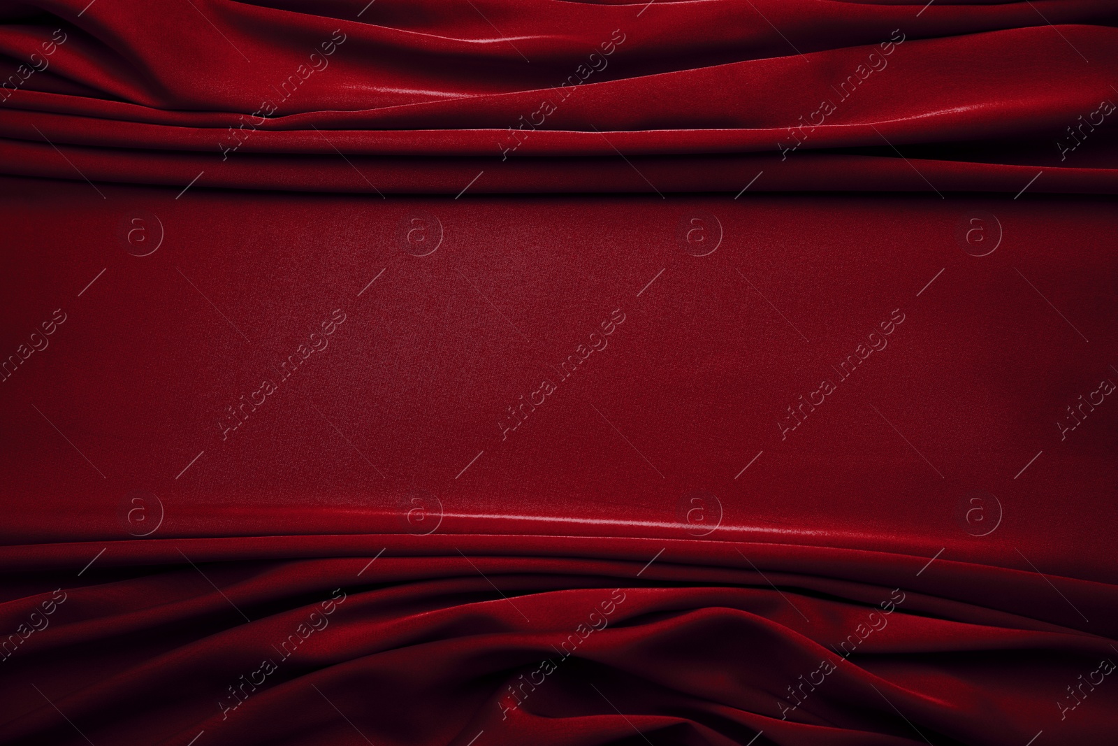 Image of Delicate dark red silk fabric as background, top view. Space for text