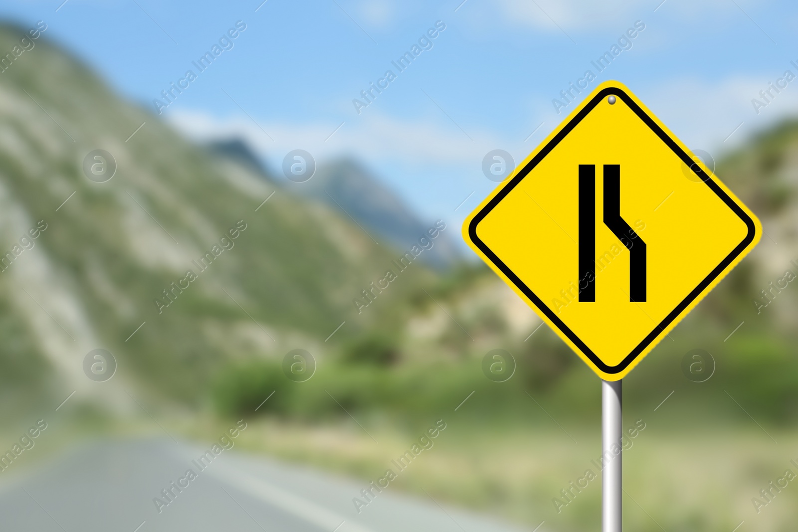 Image of Road Narrows On Right road sign on highway, space for text