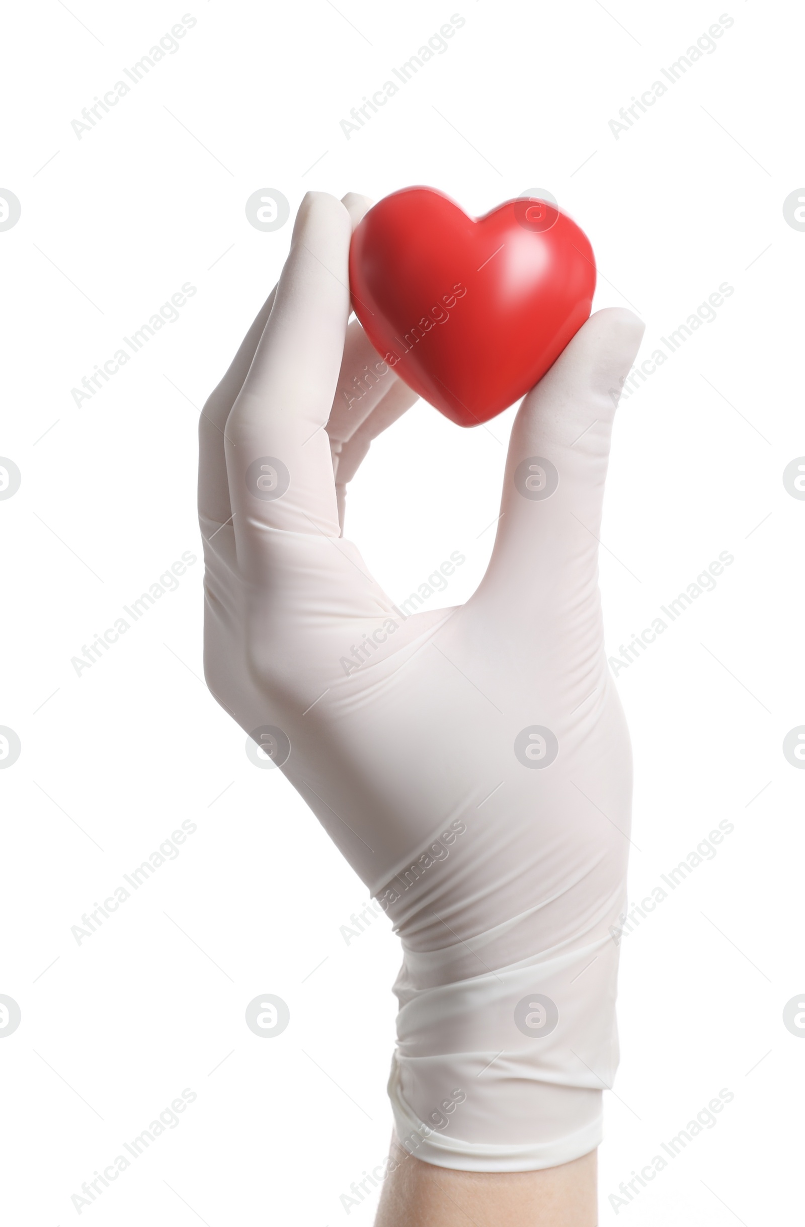 Photo of Doctor in medical glove holding red heart on white background, closeup