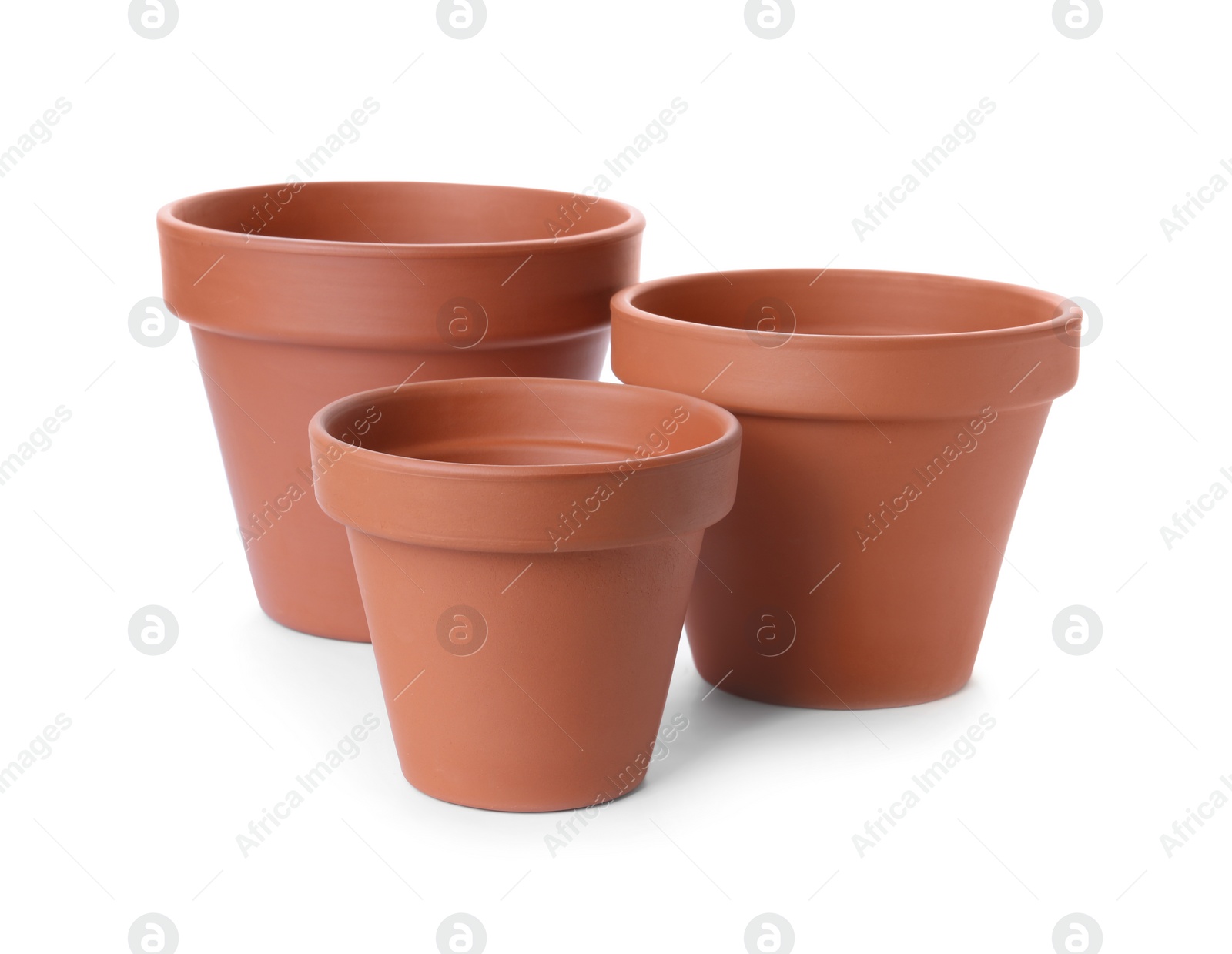 Photo of Stylish terracotta flower pots isolated on white