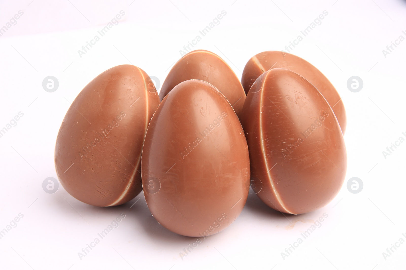 Photo of Sveti Vlas, Bulgaria - June 27, 2023: Unwrapped Kinder Surprise Eggs isolated on white