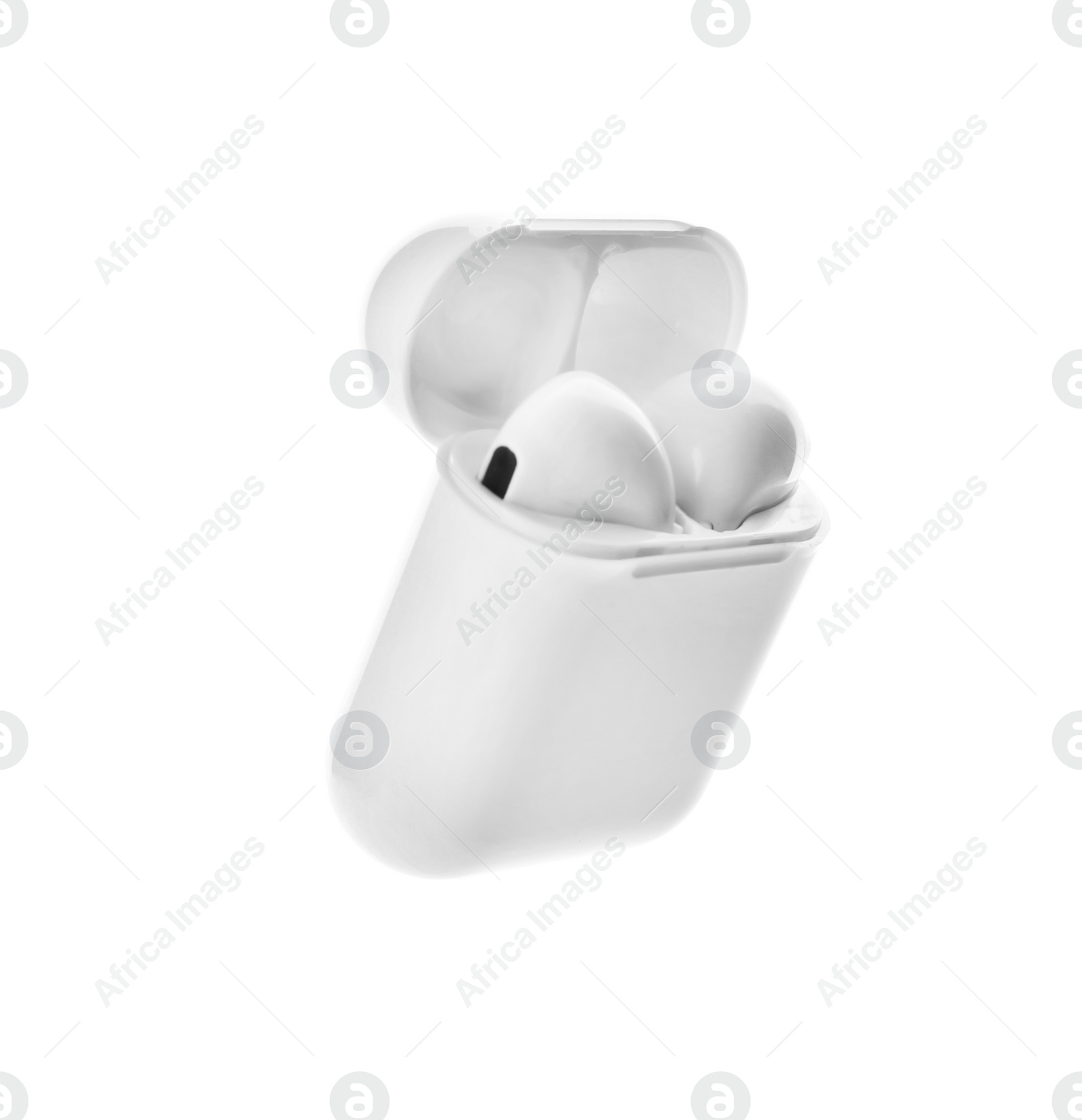 Photo of Modern wireless earphones in charging case on white background