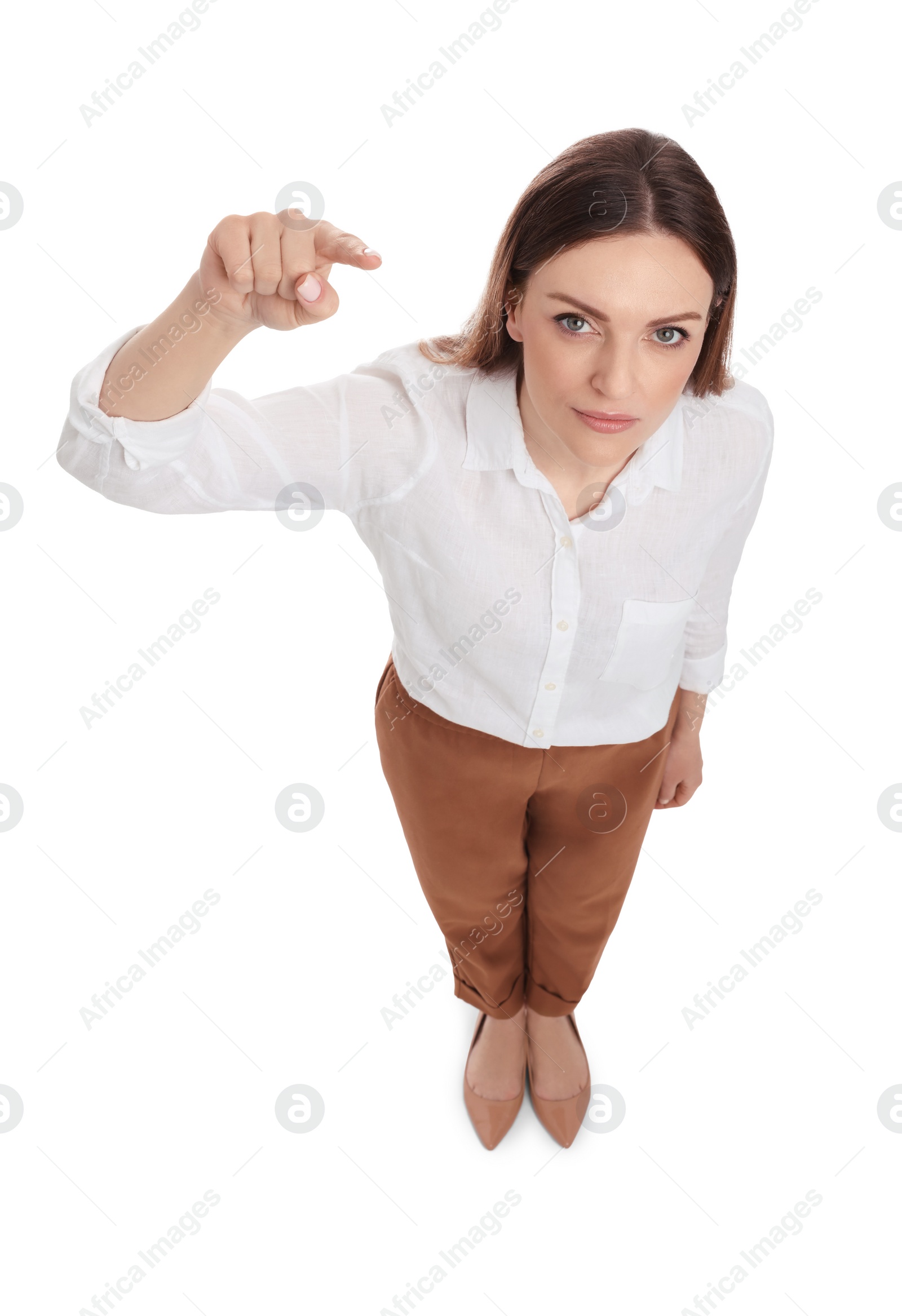 Photo of Beautiful businesswoman pointing at something on white background, above view