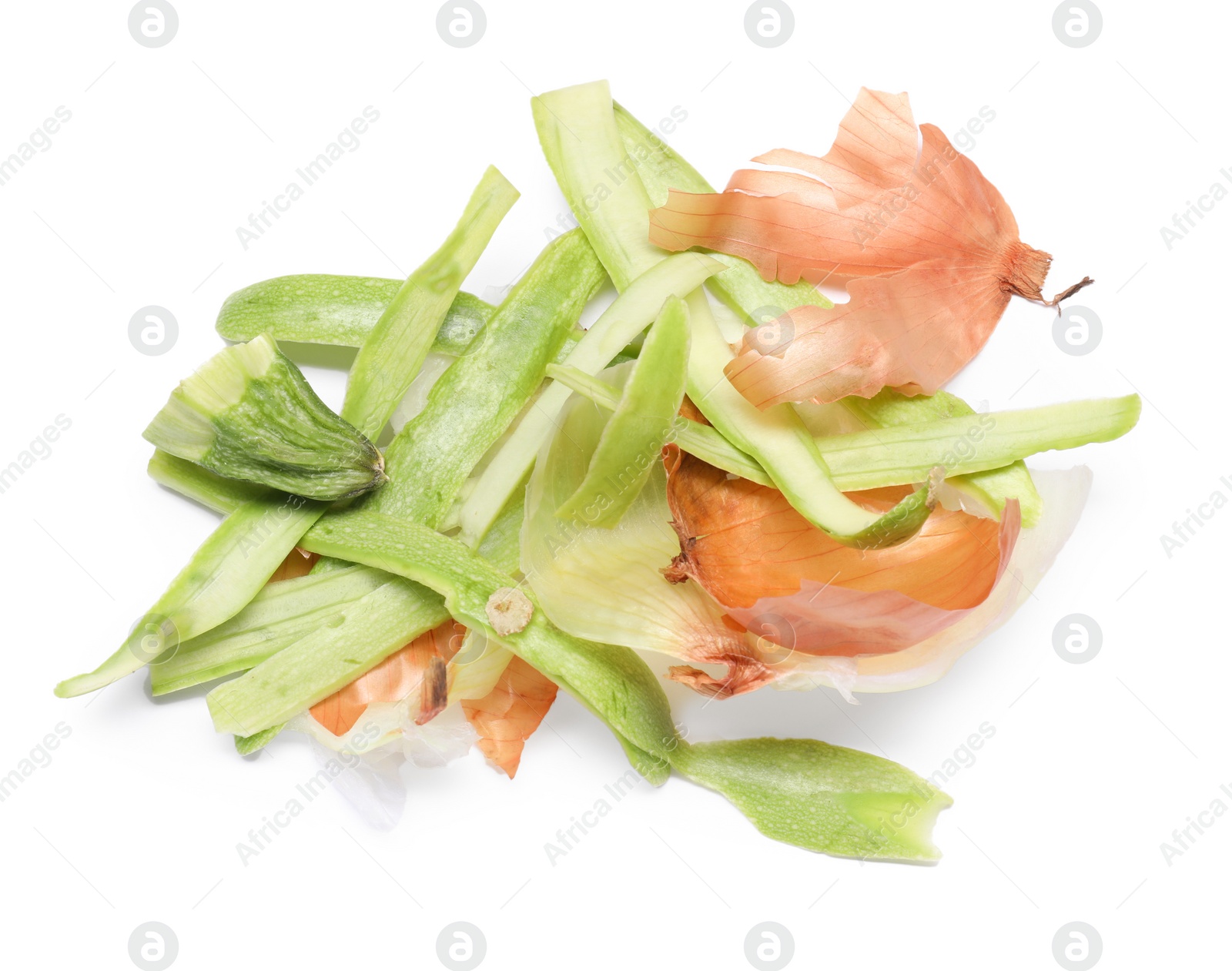 Photo of Peels of fresh vegetables isolated on white, above view