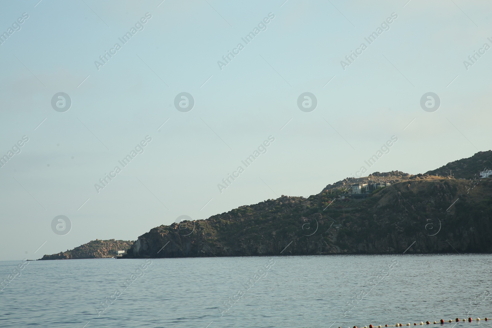 Photo of Picturesque view of sea and shore under blue sky