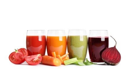 Photo of Delicious vegetable juices and fresh ingredients on white background