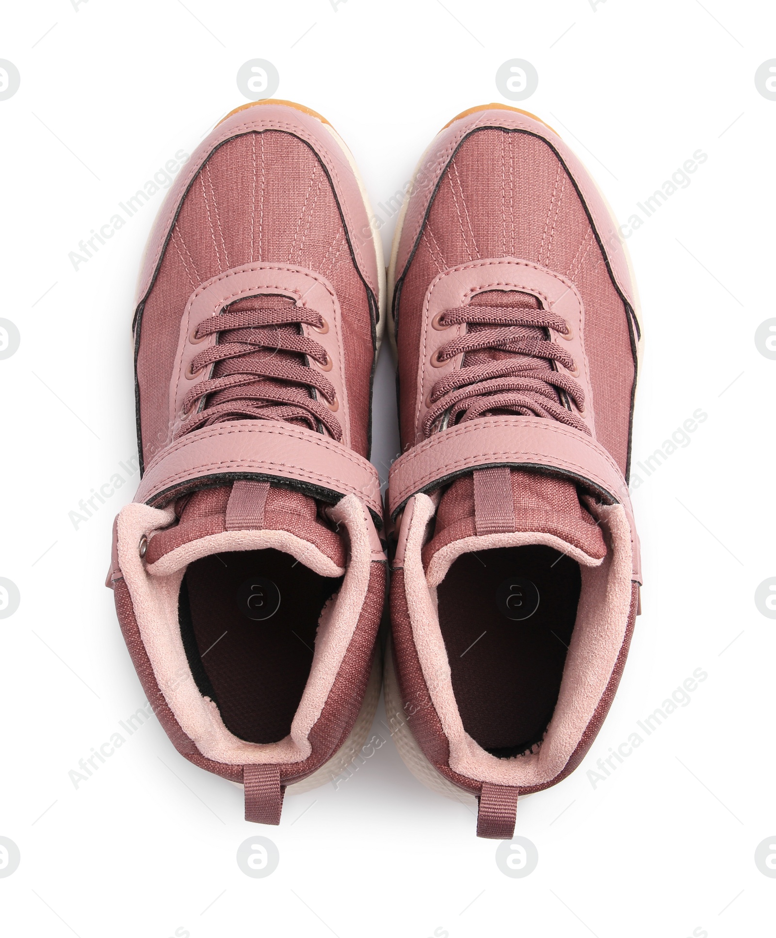 Photo of Pair of stylish kid's sneakers isolated on white, top view