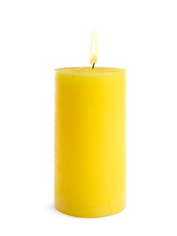 Photo of Decorative yellow wax candle on white background