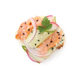 Photo of Tasty canape with salmon, cucumber, radish and cream cheese isolated on white, top view