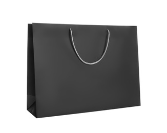 Photo of Black paper shopping bag isolated on white