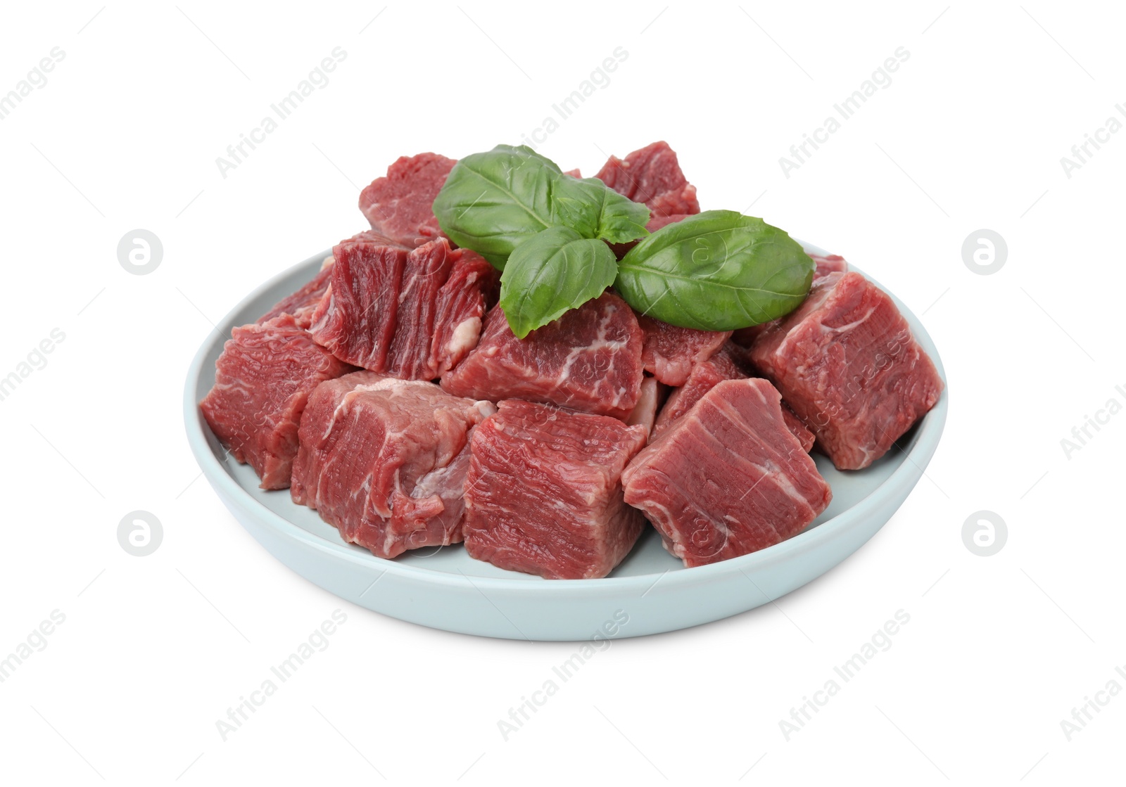 Photo of Fresh raw cut beef with basil leaves isolated on white