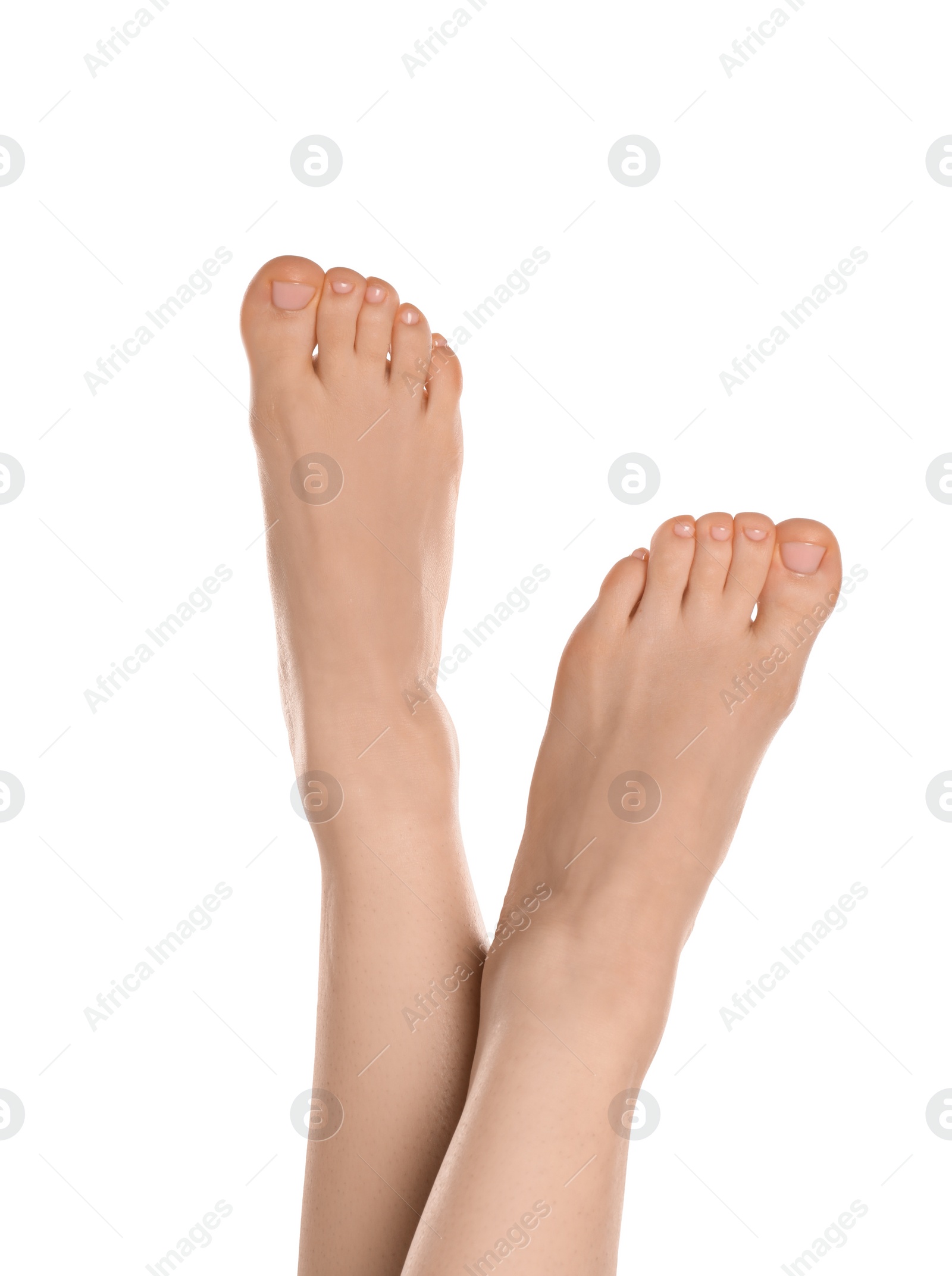 Photo of Woman with neat toenails after pedicure procedure isolated on white, closeup