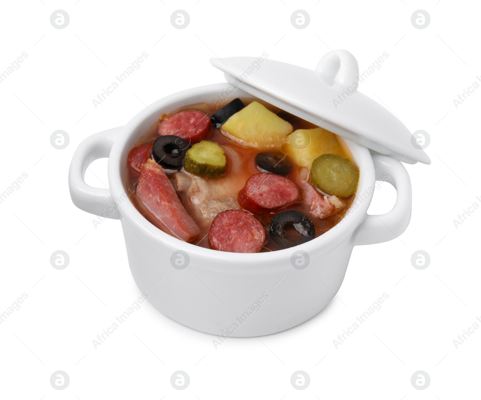 Photo of Meat solyanka soup with thin dry smoked sausages in pot isolated on white