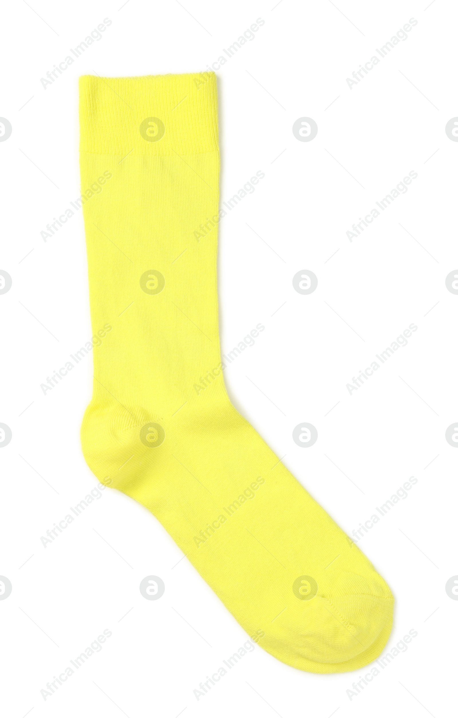 Photo of Yellow sock on white background, top view