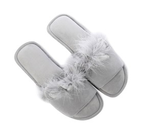 Photo of Pair of soft slippers with fur isolated on white, top view