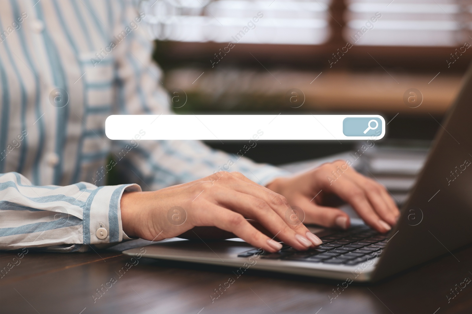 Image of Search bar of website and woman working with laptop in office, closeup