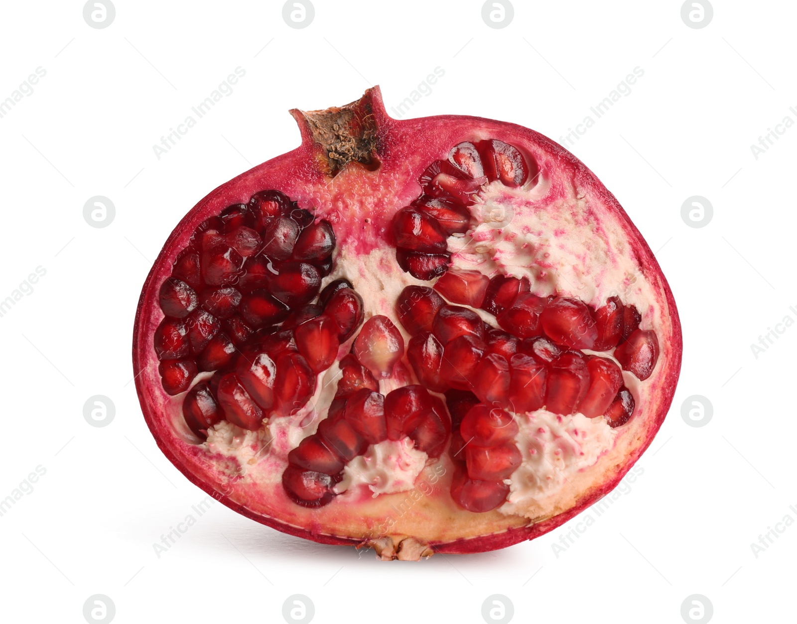 Photo of Half of ripe pomegranate on white background