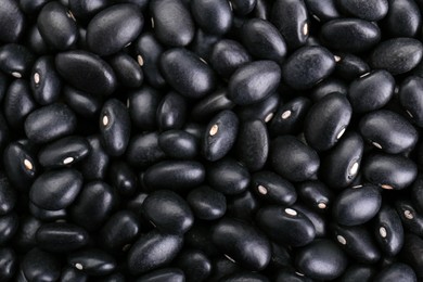 Many raw black beans as background, closeup