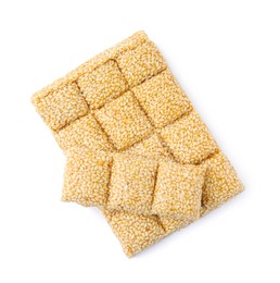 Photo of Delicious sesame kozinaki bars on white background, top view