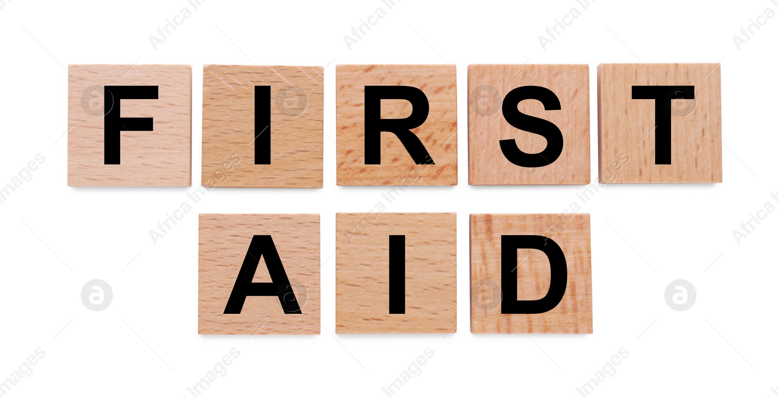 Photo of Words First Aid made of wooden cubes isolated on white, top view