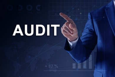 Image of Audit concept. Businessman pointing at graph on dark blue background, closeup. Scheme and world map illustration