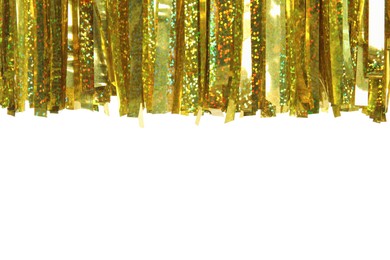 Photo of Shiny golden tinsel on white background, closeup