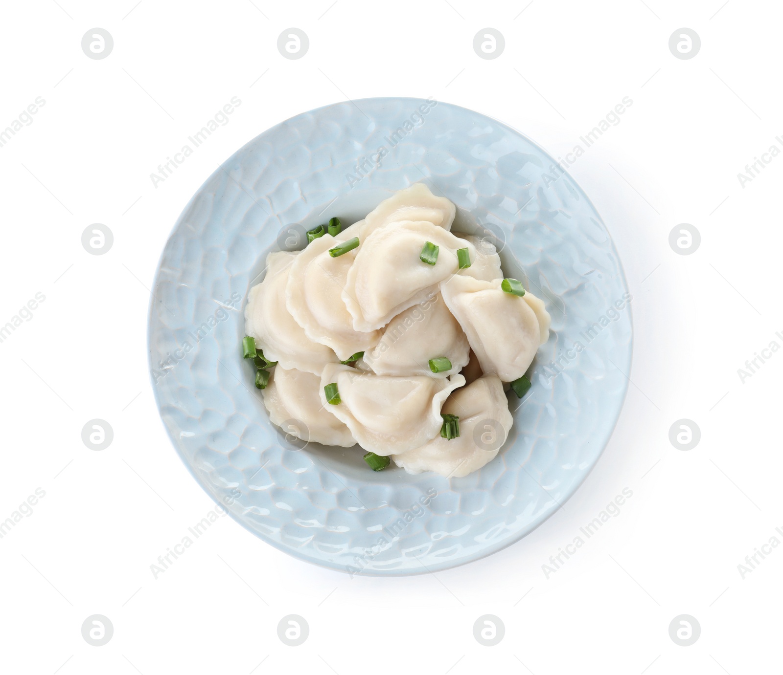 Photo of Plate of tasty dumplings served with green onion on white background, top view