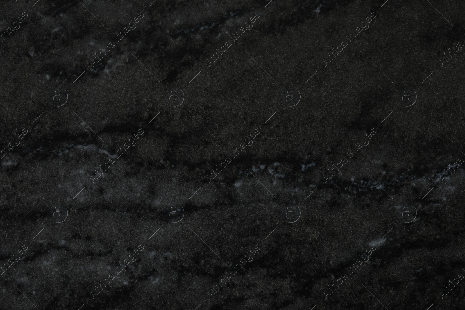 Photo of Black marble surface as background, closeup view