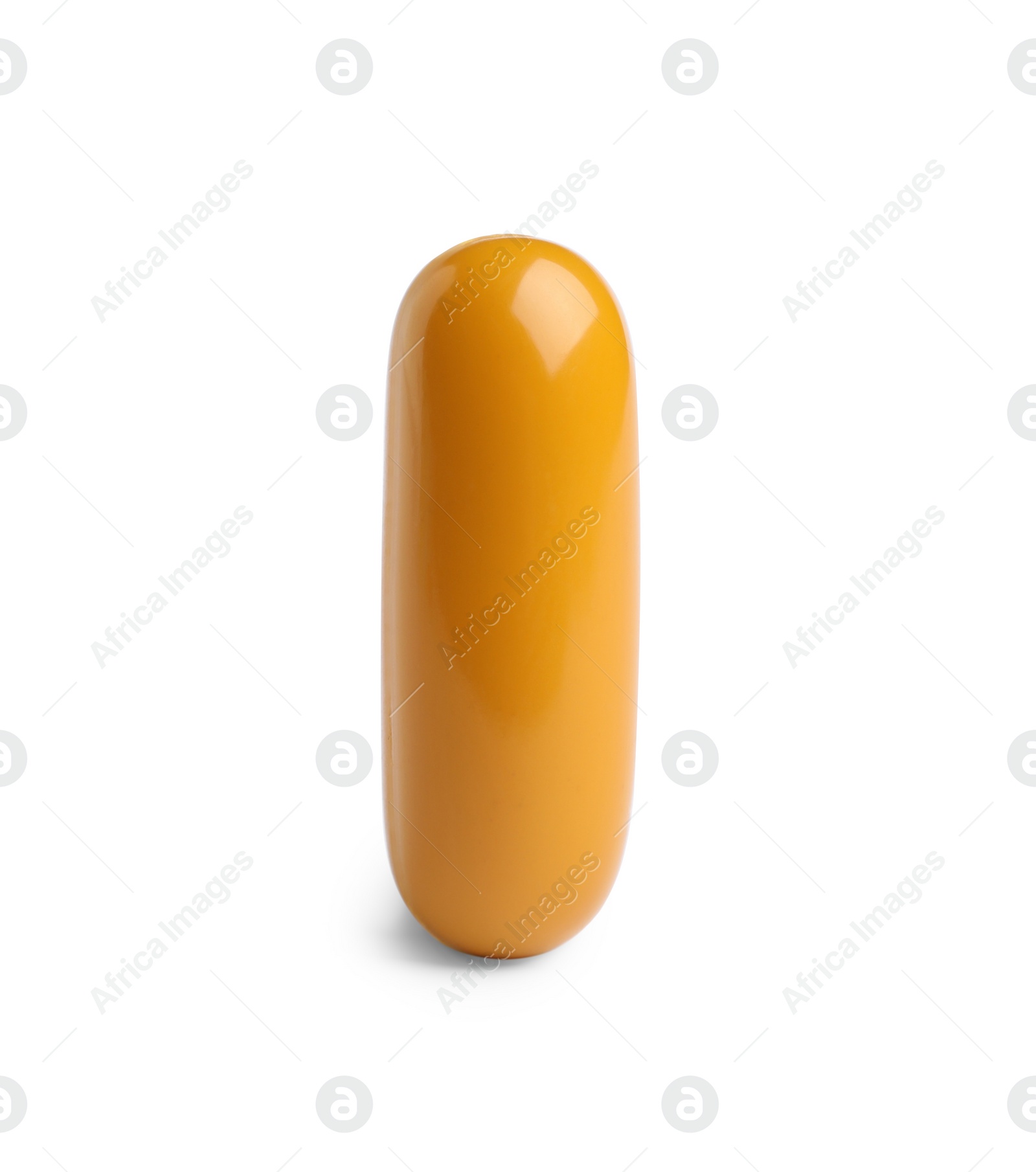 Photo of One orange pill on white background. Medicinal treatment