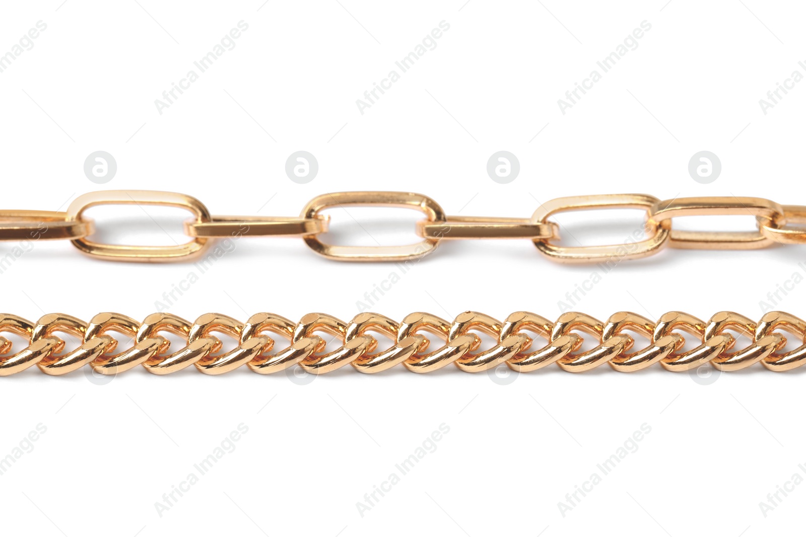 Photo of Metal chains isolated on white. Luxury jewelry