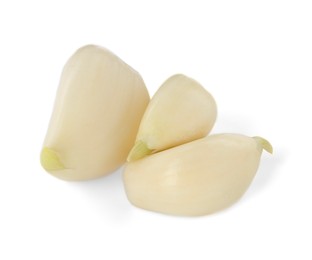 Peeled cloves of fresh garlic isolated on white