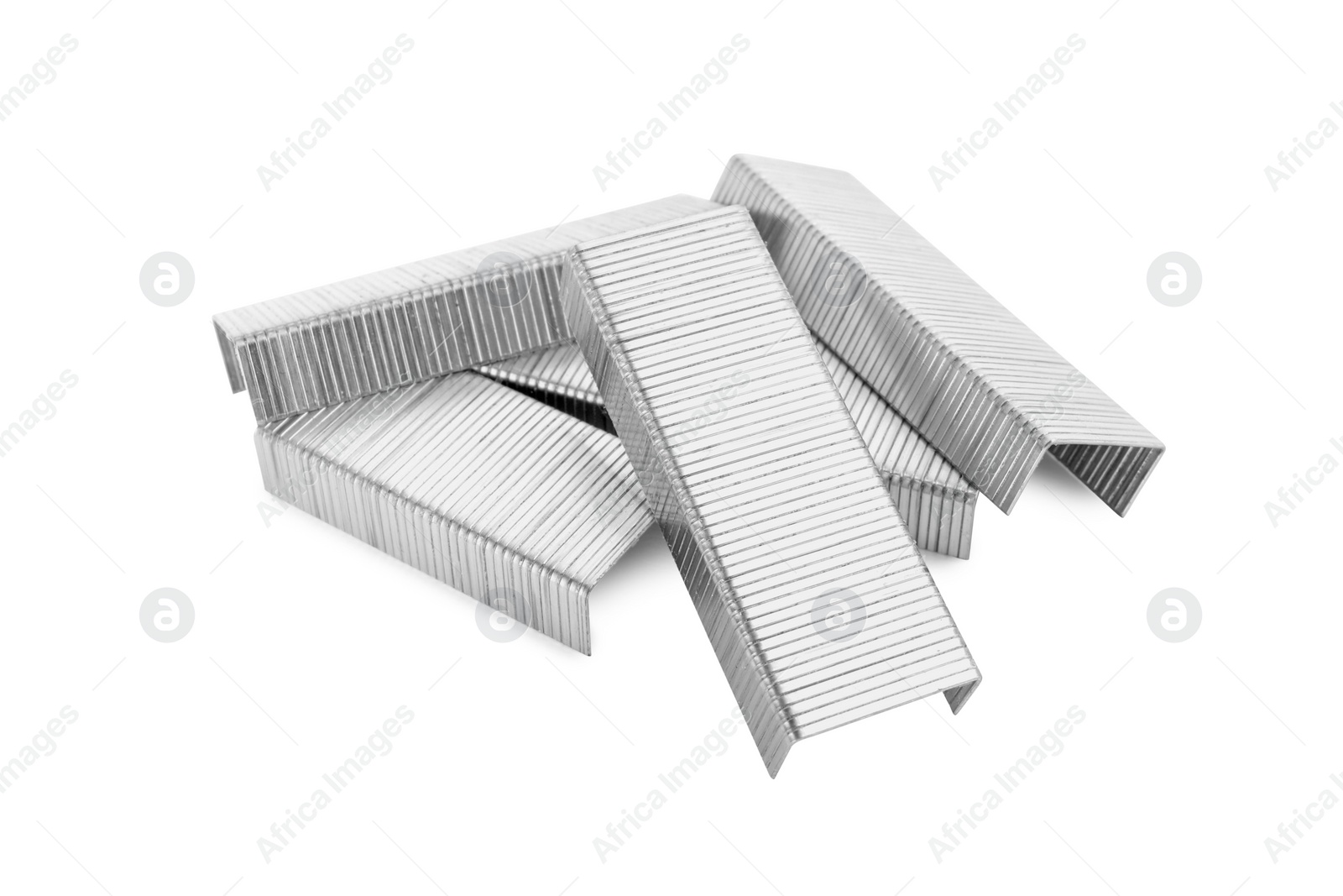 Photo of Staple gun refills on white background. Office supplies