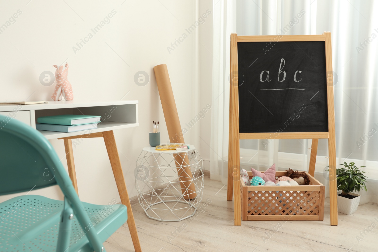 Photo of Modern child room interior with stylish furniture