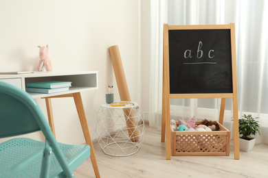 Modern child room interior with stylish furniture