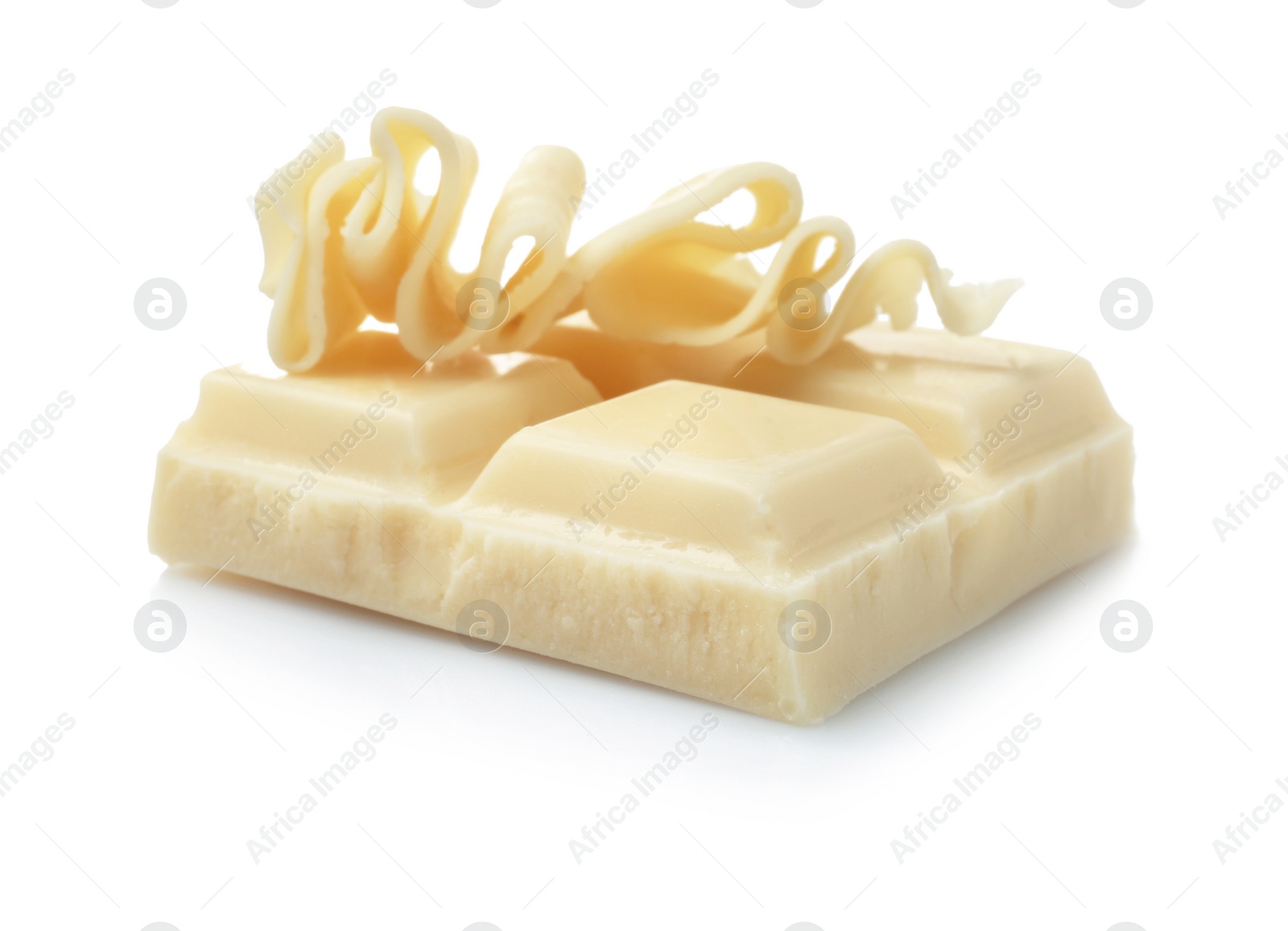 Photo of Yummy chocolate curl and piece on white background