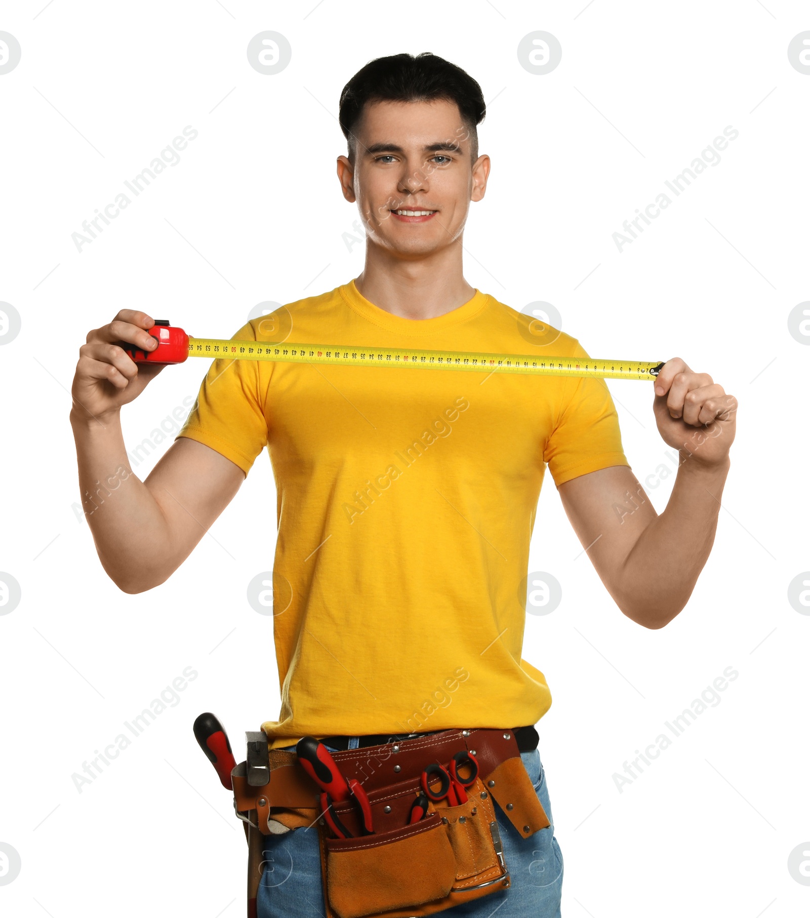 Photo of Handyman with measuring tape and tool belt isolated on white