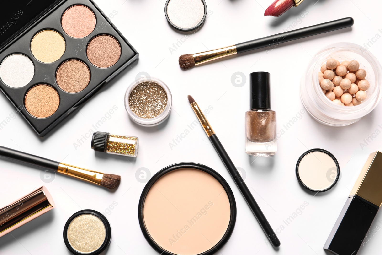 Photo of Different luxury makeup products on white background, top view