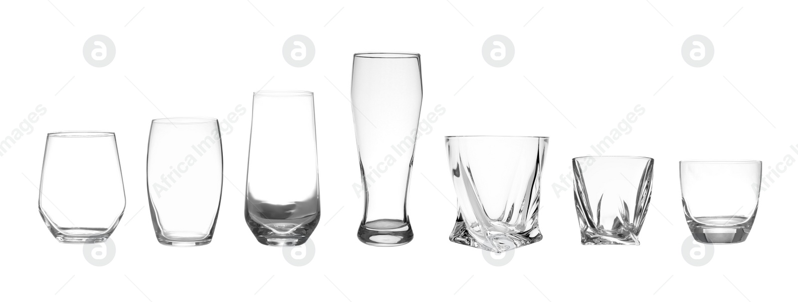 Image of Set of different empty glasses on white background. Banner design