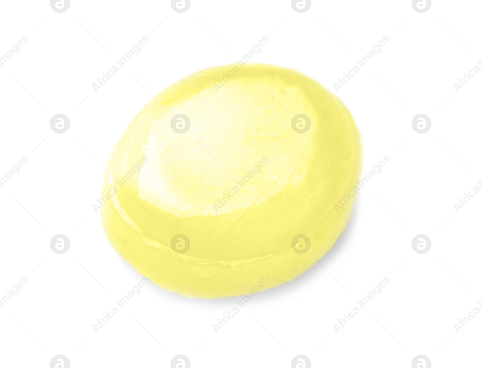 Photo of Tasty small lemon drop isolated on white