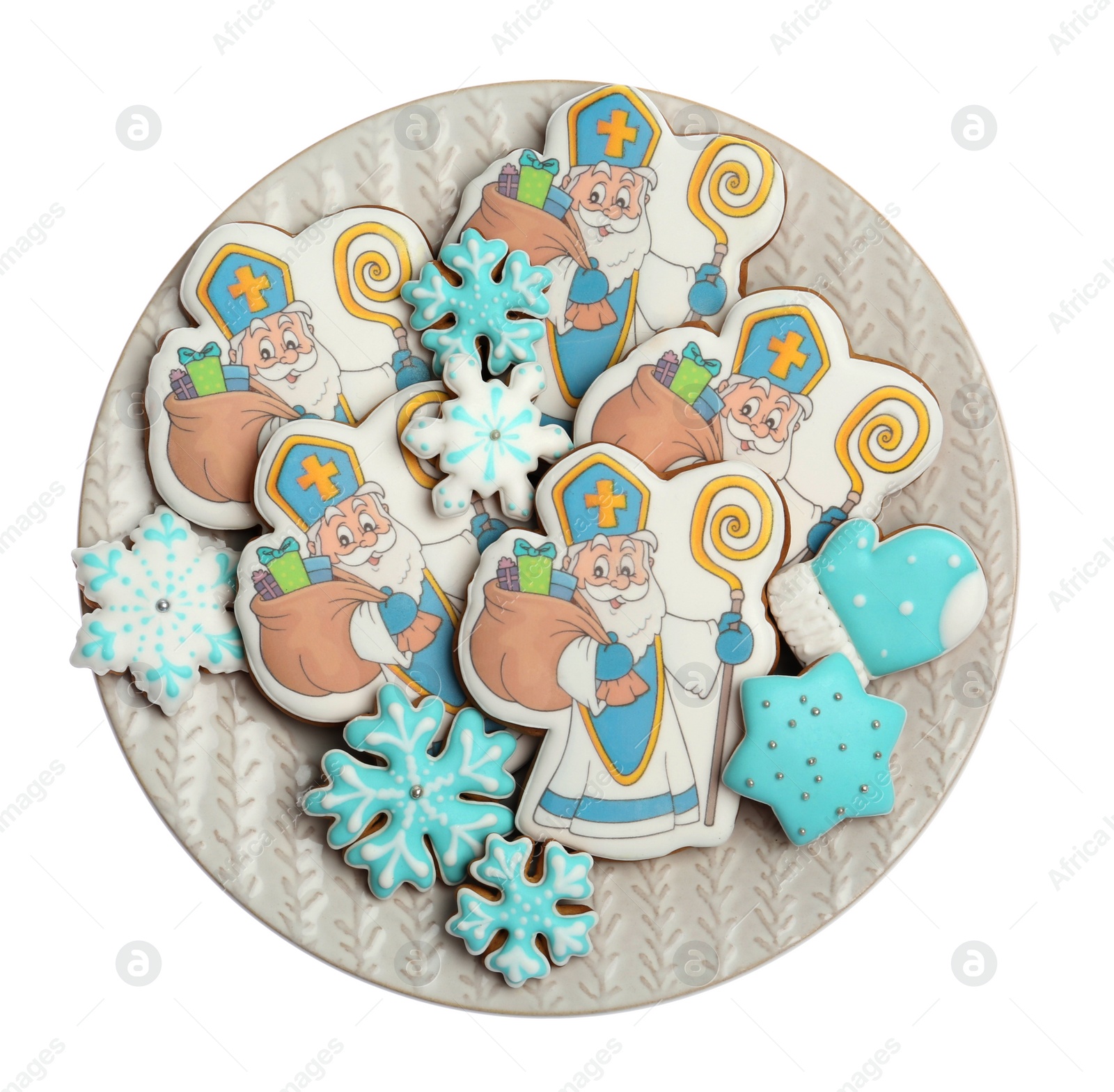 Photo of Tasty gingerbread cookies on white background, top view. St. Nicholas Day celebration