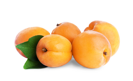 Photo of Delicious fresh ripe apricots on white background