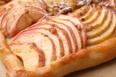 Freshly baked apple pie on table, closeup