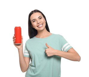 Photo of Beautiful happy woman holding red beverage can and showing thumbs up on white background