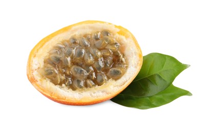 Half of delicious ripe granadilla with green leaves isolated on white