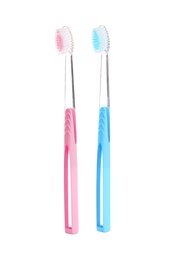 Photo of Manual toothbrushes on white background. Dental care